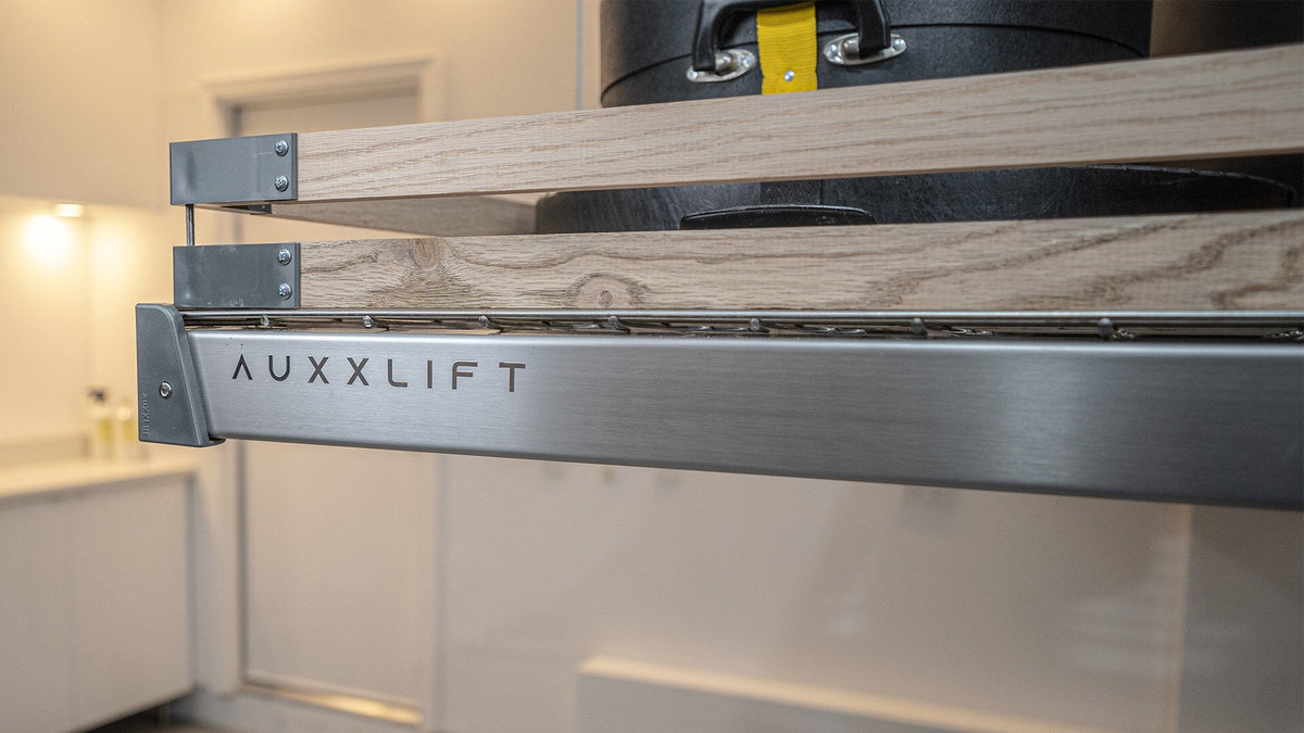 Close-up of the Auxx-Guard wood slat rail mounted to an Auxx-Lift platform frame